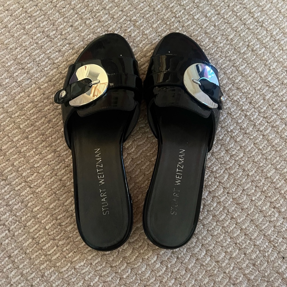Stuart Weitzman Glossy Black Mules with Silver Accent